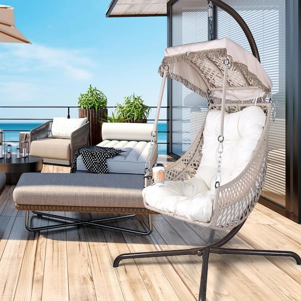 Zeus & Ruta Outdoor Wicker Patio Swing Rattan Swing Egg Chair with Sunshade Cloth, Courtyard, Beige Cushion and Pillow