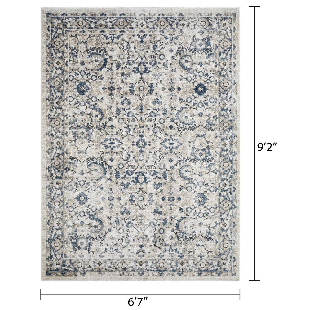 Cream and Blue Floral Border 6' x 9' Synthetic Area Rug