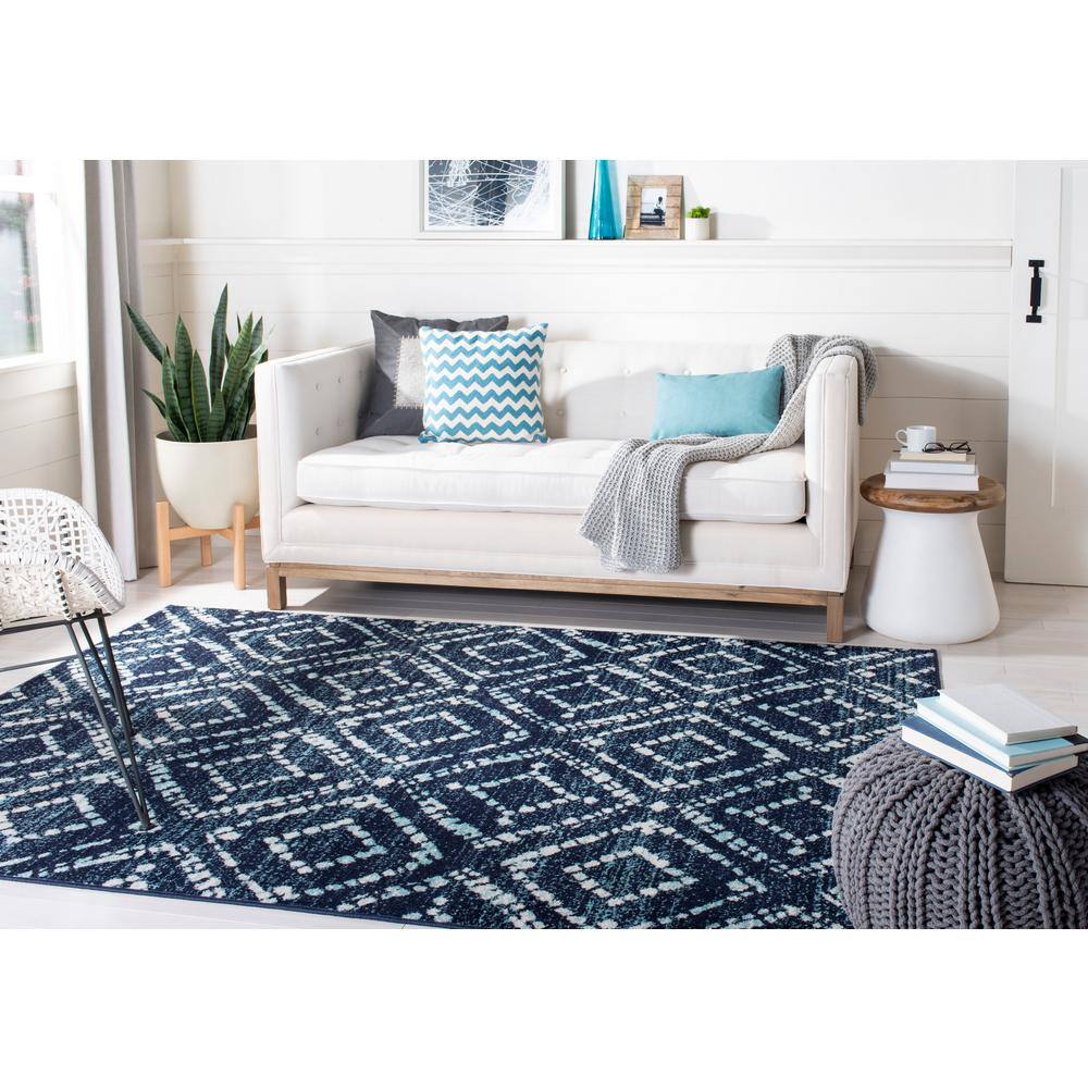 Navy and Ivory Geometric 4' x 6' Synthetic Area Rug