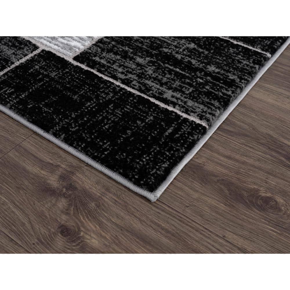 Black and Gray Geometric Synthetic 5' x 7' Area Rug