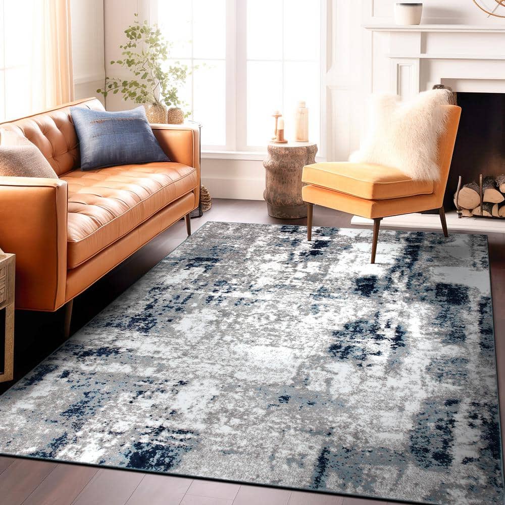 Abstract Blue Tufted Synthetic 7' 10" x 10' Area Rug