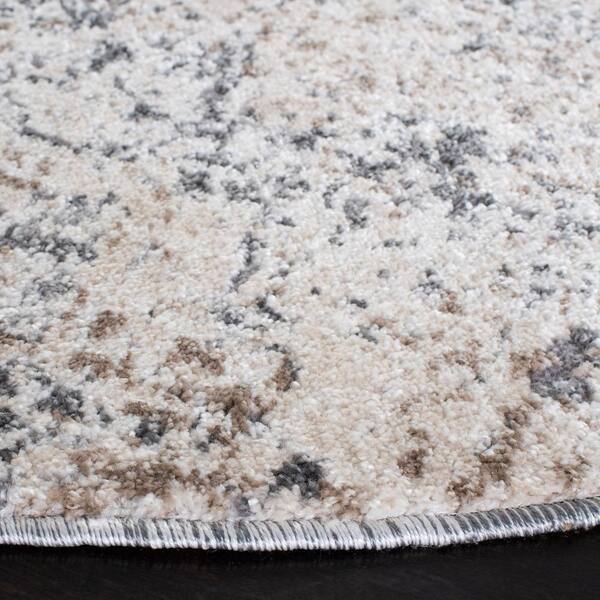 Ava Distressed 7'7 Round Area Rug in Ivory 