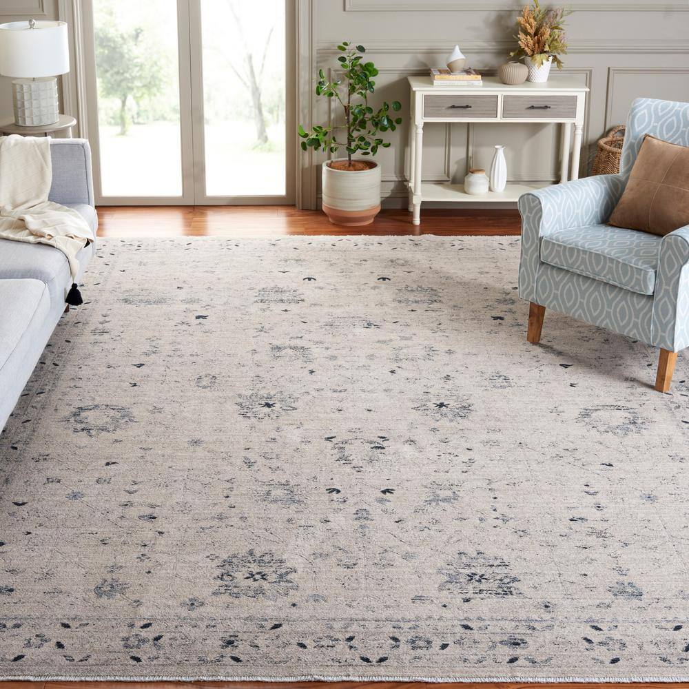 Ivory and Blue Distressed Polyester Area Rug 9' x 11'6"