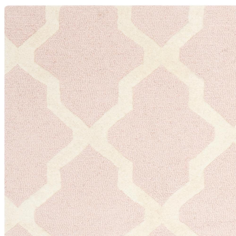 Handmade Light Pink and Ivory Wool Tufted Area Rug, 6' x 9'