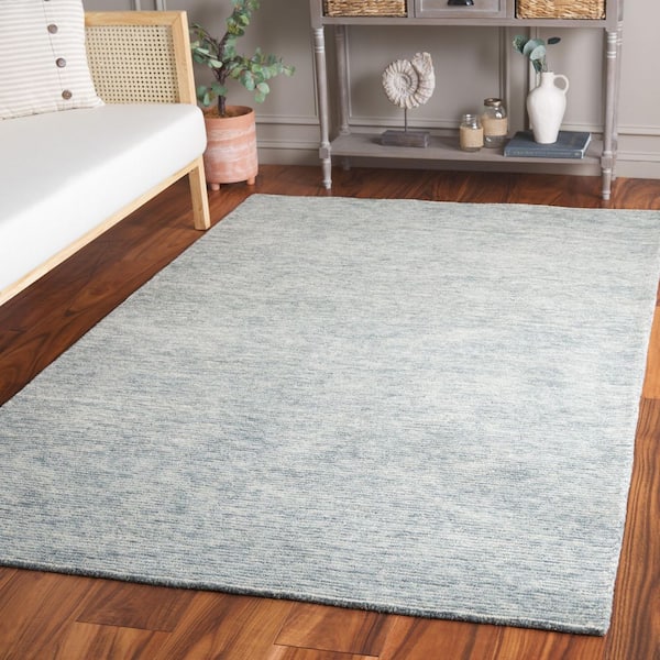 Ebony 6 ft. x 9 ft. Blue/Ivory Minimalist Solid Color Area Rug