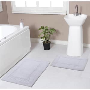 https://images.thdstatic.com/productImages/6fc0b219-efde-48ff-9862-dfc0286185ad/svn/white-bathroom-rugs-bath-mats-bcl2pc1721wh-64_300.jpg