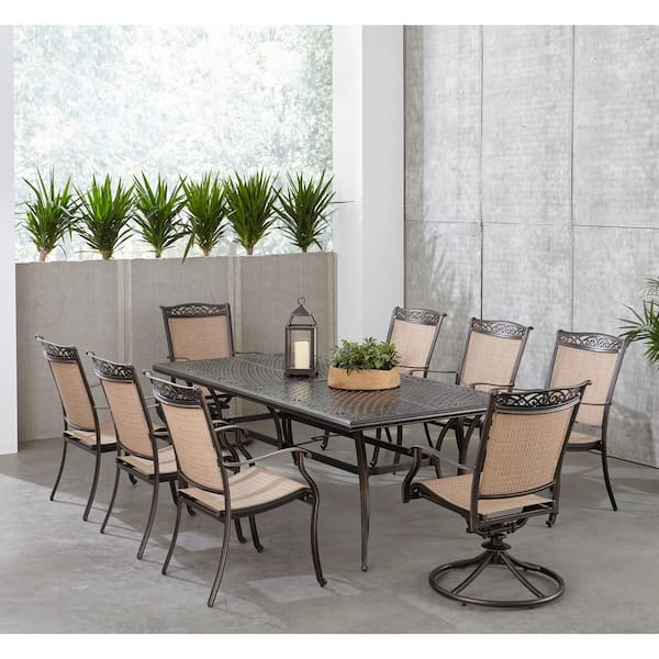 Hanover Fontana 9-Piece Aluminum Outdoor Dining Set with 2 Sling Swivel Rockers, 6 Sling Chairs, and Cast-Top Table