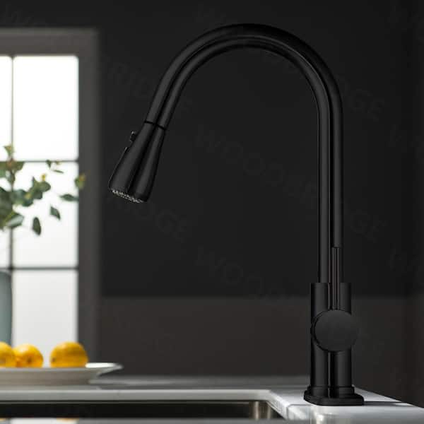 https://images.thdstatic.com/productImages/6fd89ebd-6b6e-4457-beab-e9761083d402/svn/black-woodbridge-pull-down-kitchen-faucets-wk090802bl-c3_600.jpg