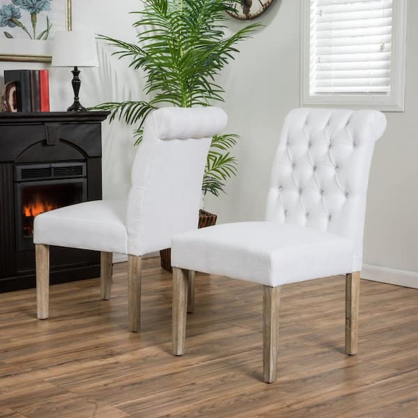 white fabric dining chairs