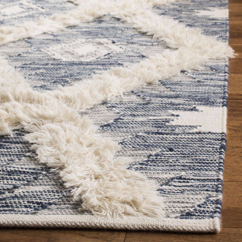 Ivory and Blue Hand-Knotted Wool 6' x 9' Area Rug