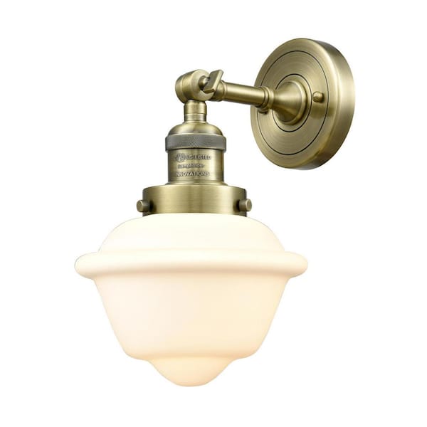Oxford 1-Light Matte White, Antique Brass Wall Sconce with White Glass Shade