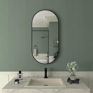 18 in. W x 36 in. H Oval Framed Wall Bathroom Vanity Mirror in Matte Black