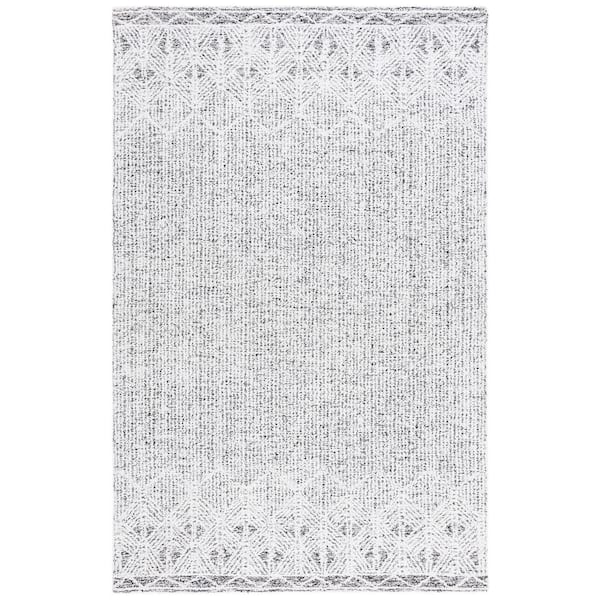SAFAVIEH Ebony Ivory/Black 6 ft. x 9 ft. Traditional Area Rug