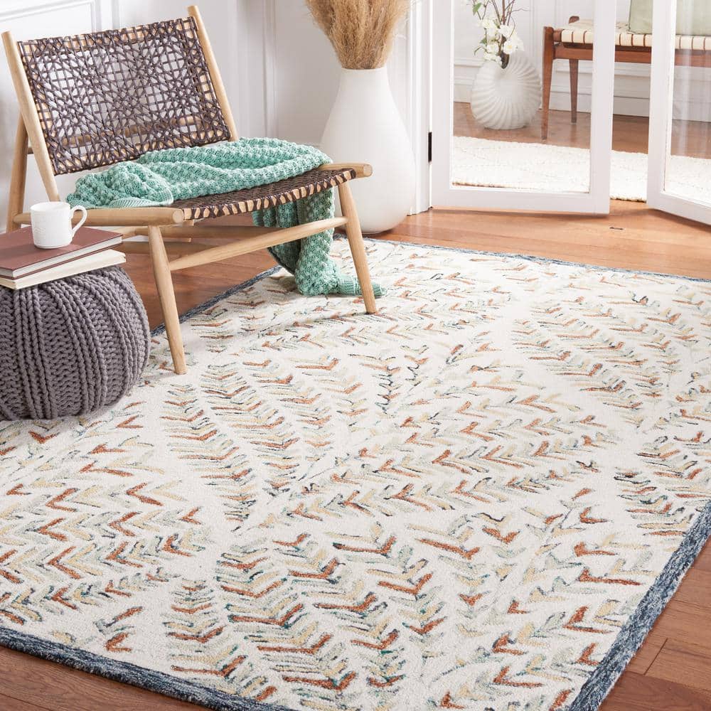 Hand-Tufted Ivory and Blue Wool 6' x 9' Area Rug