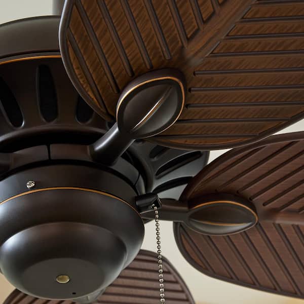Generation Lighting - Cruise 52 in. Wet Rated Coastal Outdoor Roman Bronze Ceiling Fan with American Walnut Palm Leaf Blades and Pull Chain