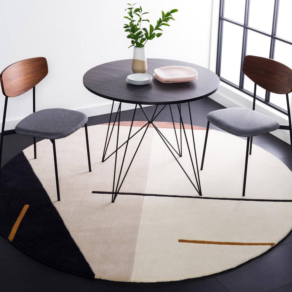 Handmade Black and Ivory Wool Round Tufted Rug