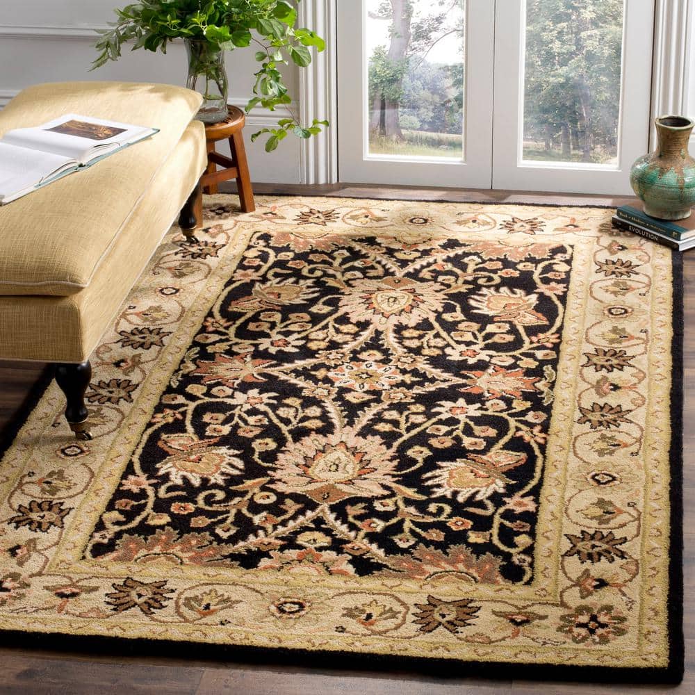 Handmade Black and Ivory Tufted Wool Area Rug
