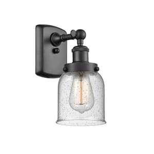 Bell 1-Light Matte Black Wall Sconce with Seedy Glass Shade