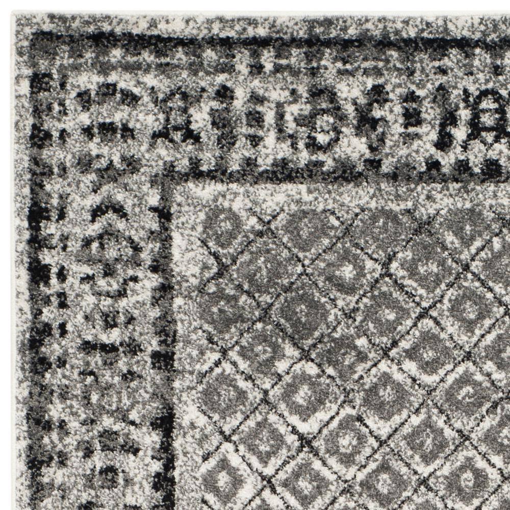 Ivory and Silver Rectangular Synthetic Area Rug