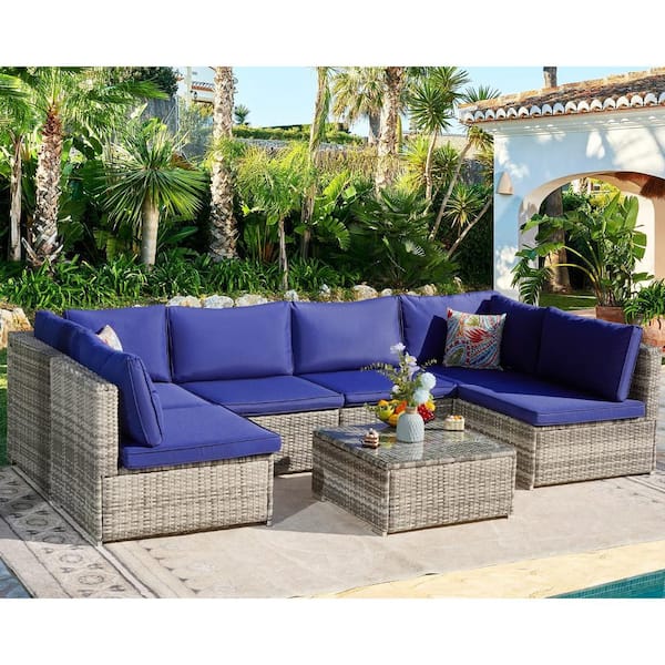 Zeus & Ruta 7-Piece Gray Wicker Outdoor Sectional Set with Blue Cushions and Coffee Table for Patio Backyard