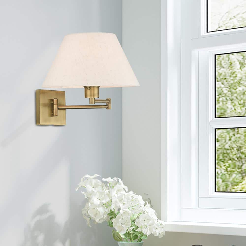 Antique Brass Swing Arm Wall Lamp with Oatmeal Fabric Shade