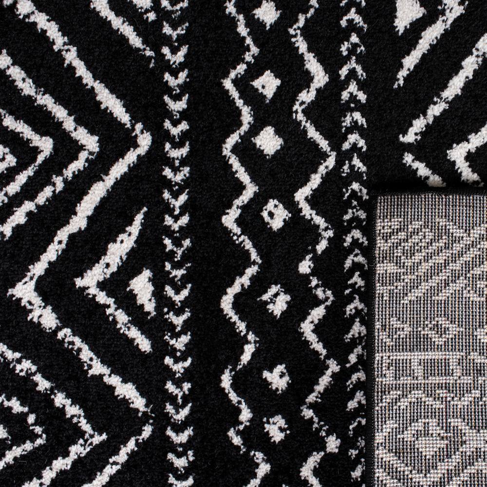 Geometric Black/Ivory Synthetic 8' x 10' Hand-knotted Area Rug