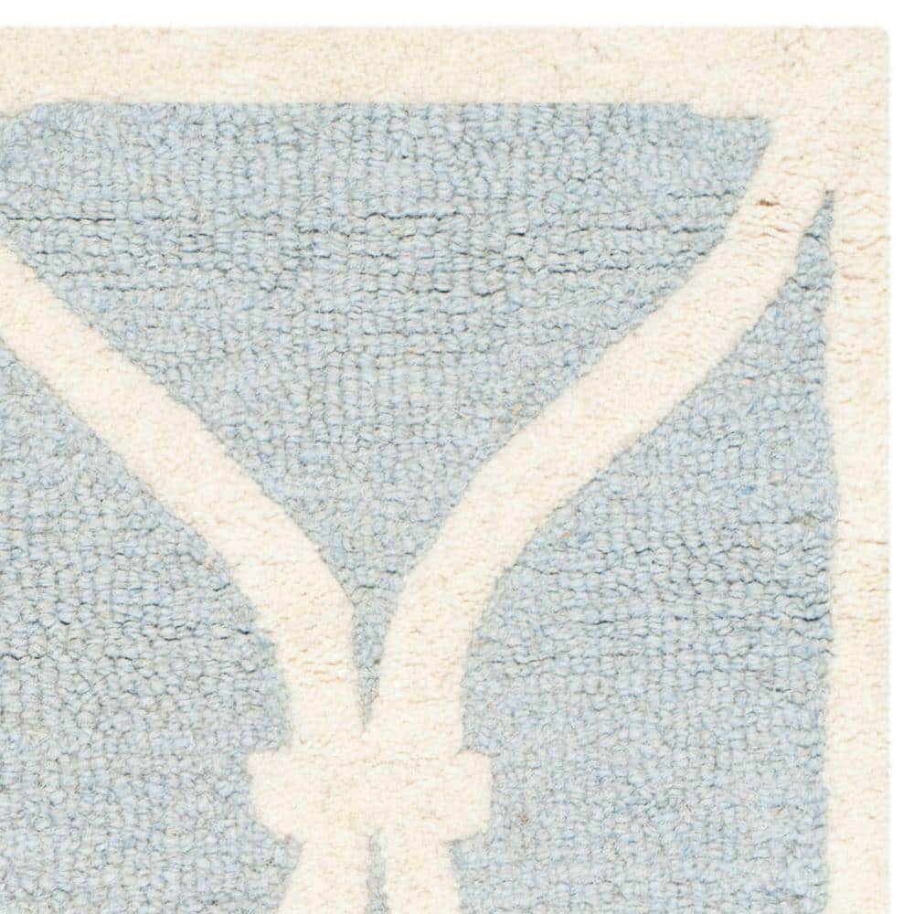 Hand-Tufted Blue and Ivory Wool Geometric Area Rug, 2' x 3'