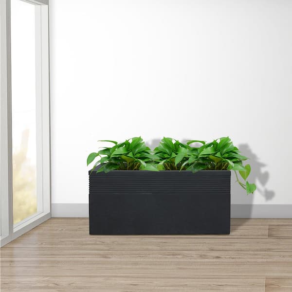 https://images.thdstatic.com/productImages/70b46d10-1fa2-4878-b99f-96d796dbcf9e/svn/charcoal-kante-plant-pots-rf0131b-c60121-44_600.jpg