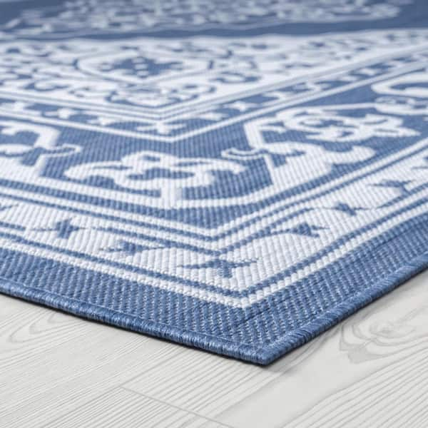 https://images.thdstatic.com/productImages/70b9539f-3832-54fd-84bb-e383e3067440/svn/blue-tayse-rugs-outdoor-rugs-eco1602-4x6-c3_600.jpg