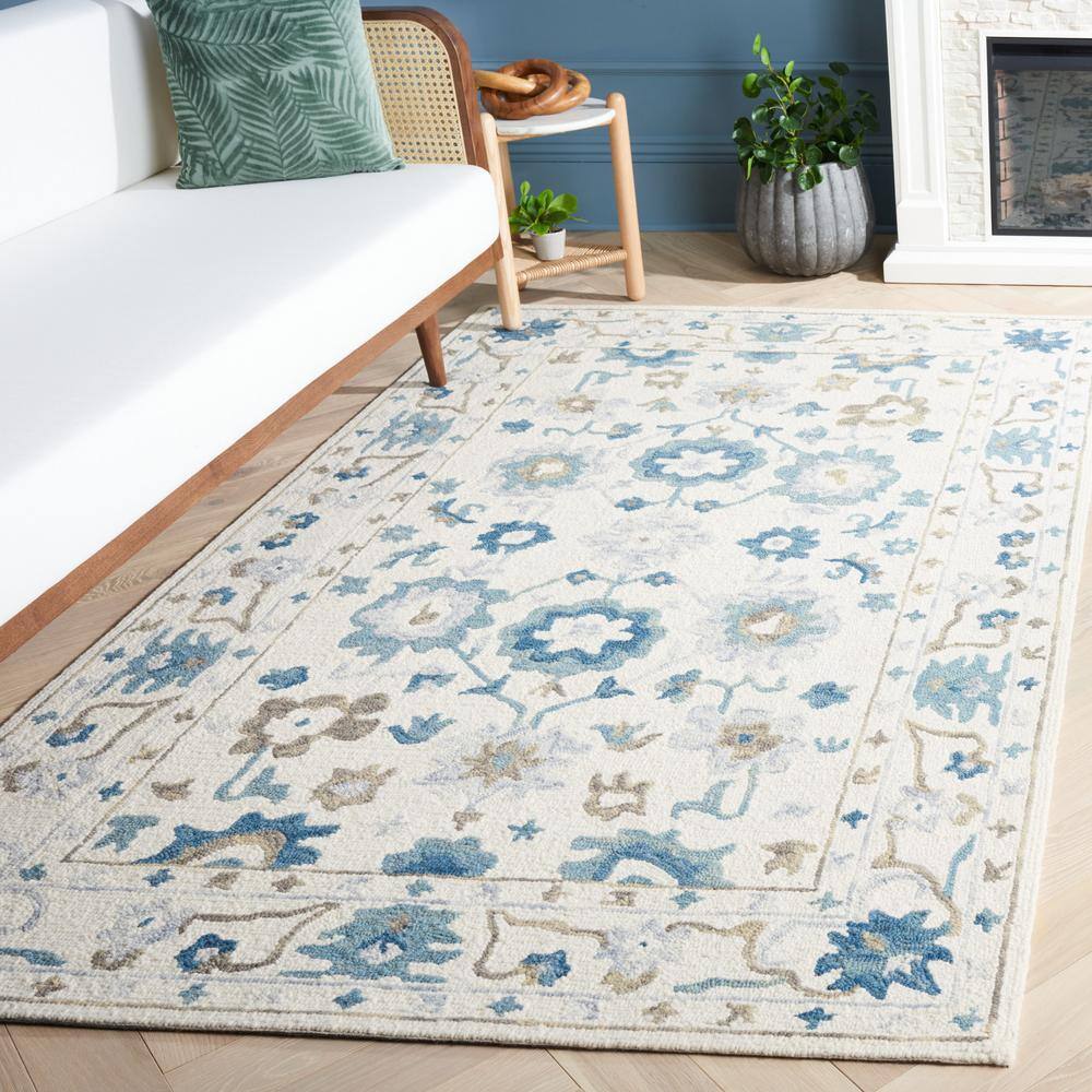 Ivory and Blue Handmade Wool Floral 3' x 5' Area Rug