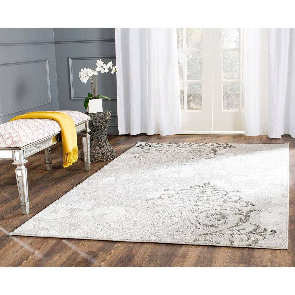 Silver and Ivory Floral Reversible 4' x 6' Synthetic Rug
