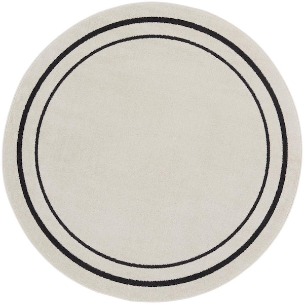 Nourison Essentials Ivory/Black 4 ft. x 4 ft. Round Solid Contemporary Indoor/Outdoor Area Rug