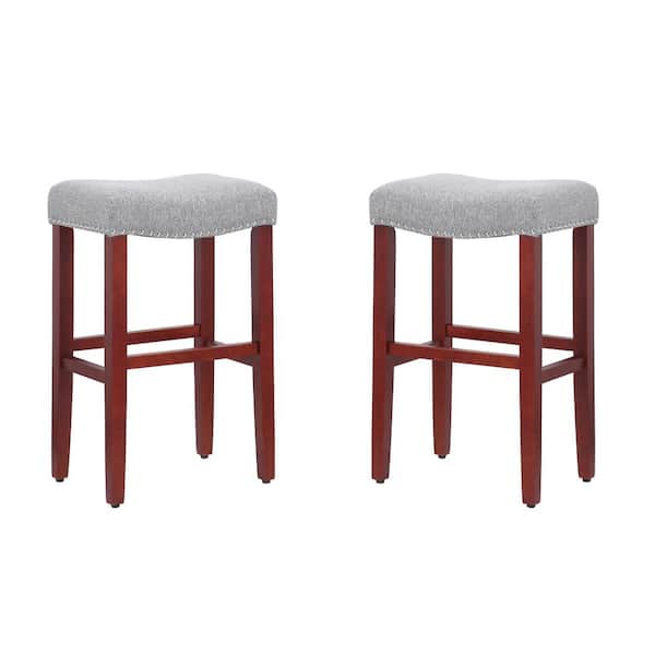 WESTINFURNITURE Jameson 29 in. Bar Height Cherry Wood Backless Barstool with Upholstered Gray Linen Saddle Seat Stool (Set of 2)