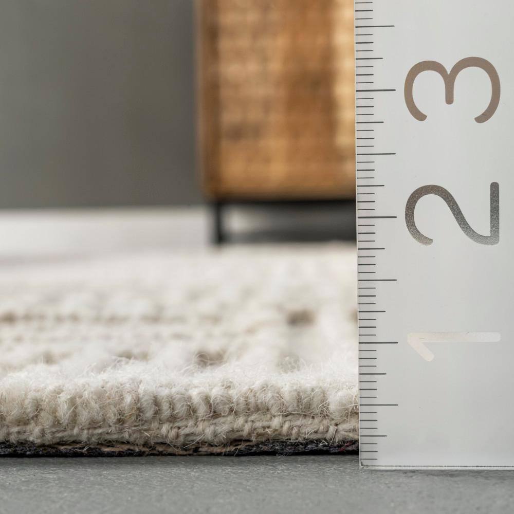 Handmade Ivory Wool Geometric 8' x 10' Area Rug