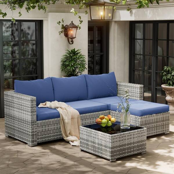 Poteban 4-Person Gray Wicker Outdoor Seating Group with Navy Cushions