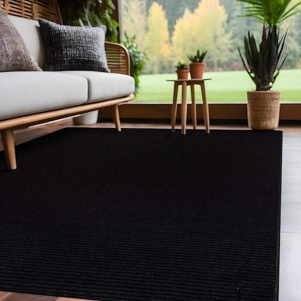 Oasis Solid Black 5 ft. x 7 ft. Non-Slip Rubber Back Indoor Area Rug