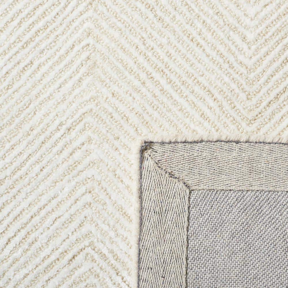 Ivory and Beige 9' x 12' Handmade Tufted Wool Viscose Rug