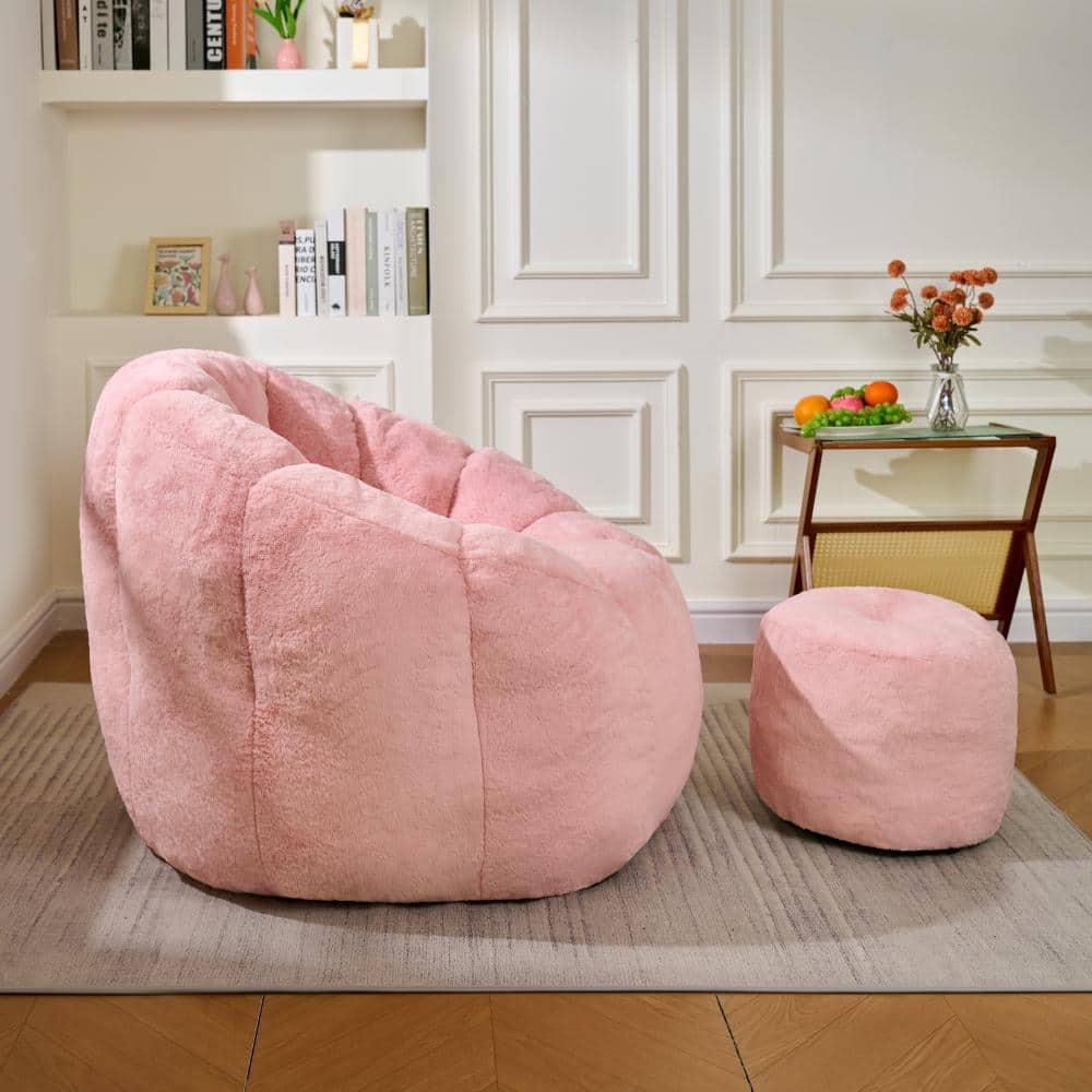 Pink bean bag chair and ottoman in a living room.