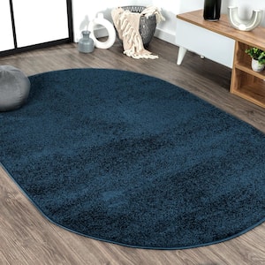 Haze Solid Low-Pile Navy 6 ft. x 9 ft. Oval Area Rug