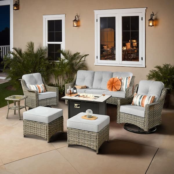 XIZZI Cristiano 7-Piece Wicker Patio Rectangular Fire Pit Set with Light Gray Cushions and Swivel Rocking Chairs