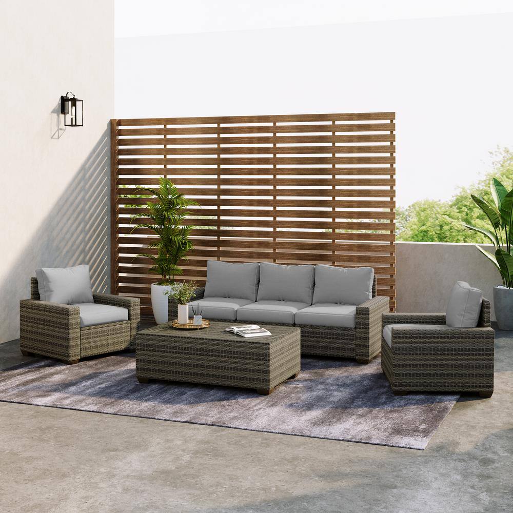 6-piece rattan outdoor seating set with light gray cushions.