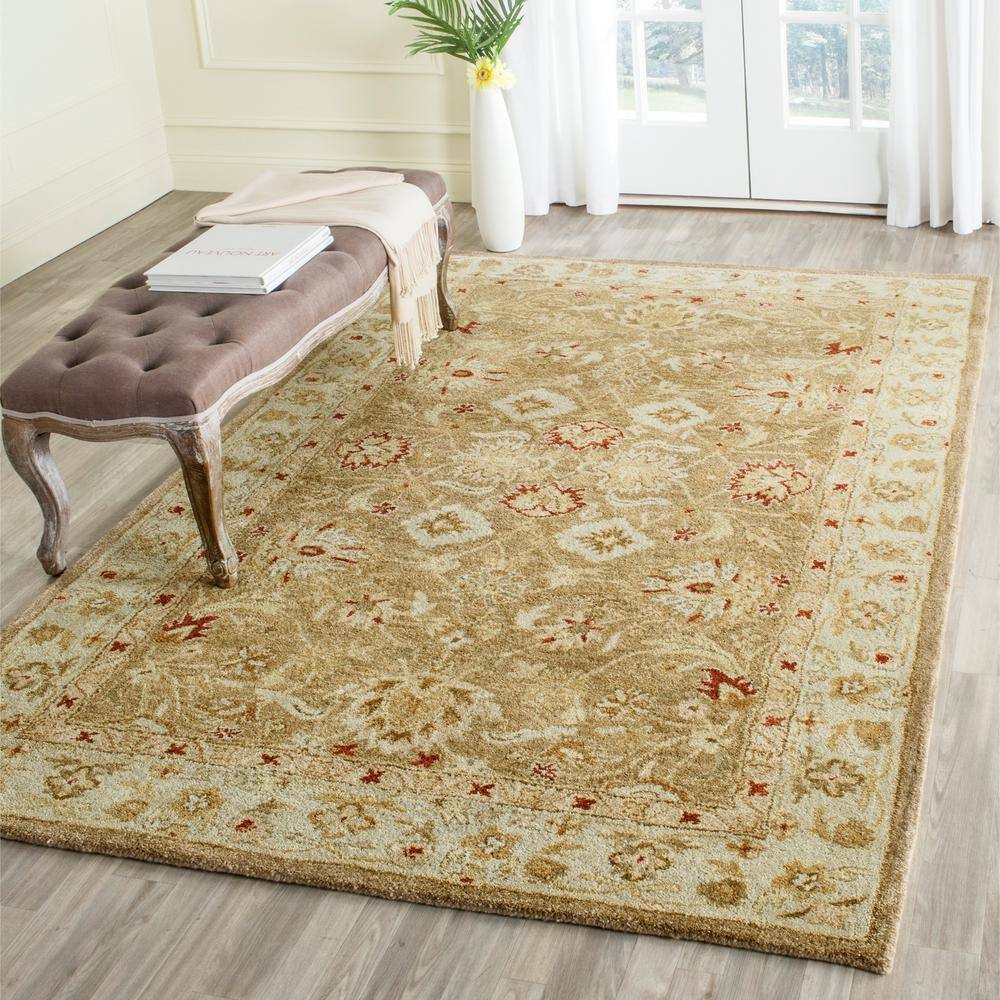 Handmade Beige and Red Floral Wool Area Rug 6' x 9'
