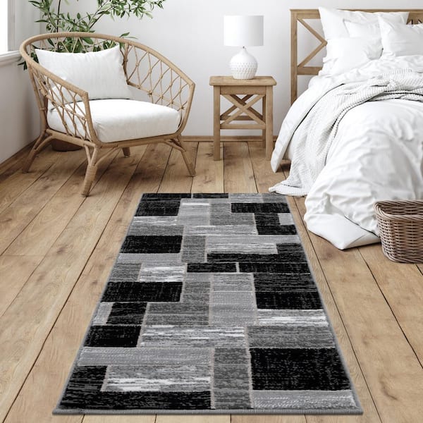 https://images.thdstatic.com/productImages/7138714b-16d2-4486-a19d-88e8a81113b7/svn/black-gray-l-baiet-area-rugs-sl973c26-black-31_600.jpg