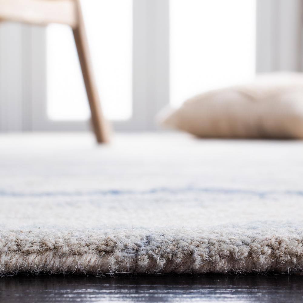 Ivory and Blue Round Hand-Tufted Wool Abstract Rug