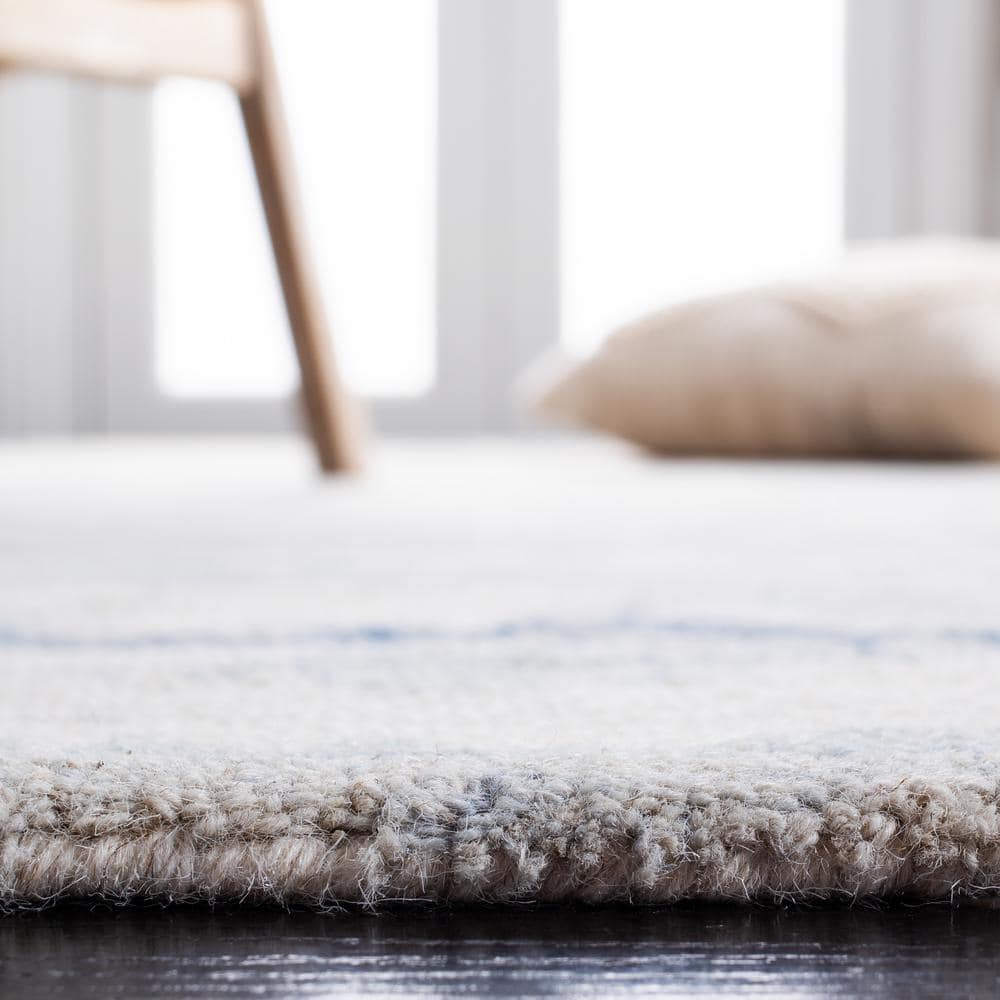 Ivory and Blue Abstract Hand-Tufted Wool 8' x 10' Rug