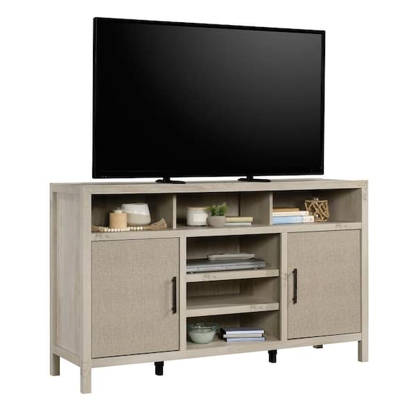 https://images.thdstatic.com/productImages/71475f0e-e09a-4ba4-92f4-0be5d9b81b1a/svn/chalked-chestnut-sauder-tv-stands-427038-e1_600.jpg