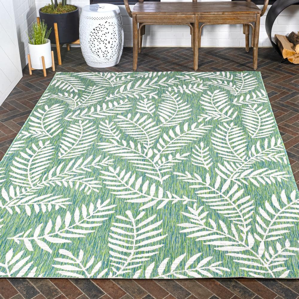 4' x 6' Green and Cream Synthetic Palm Frond Area Rug