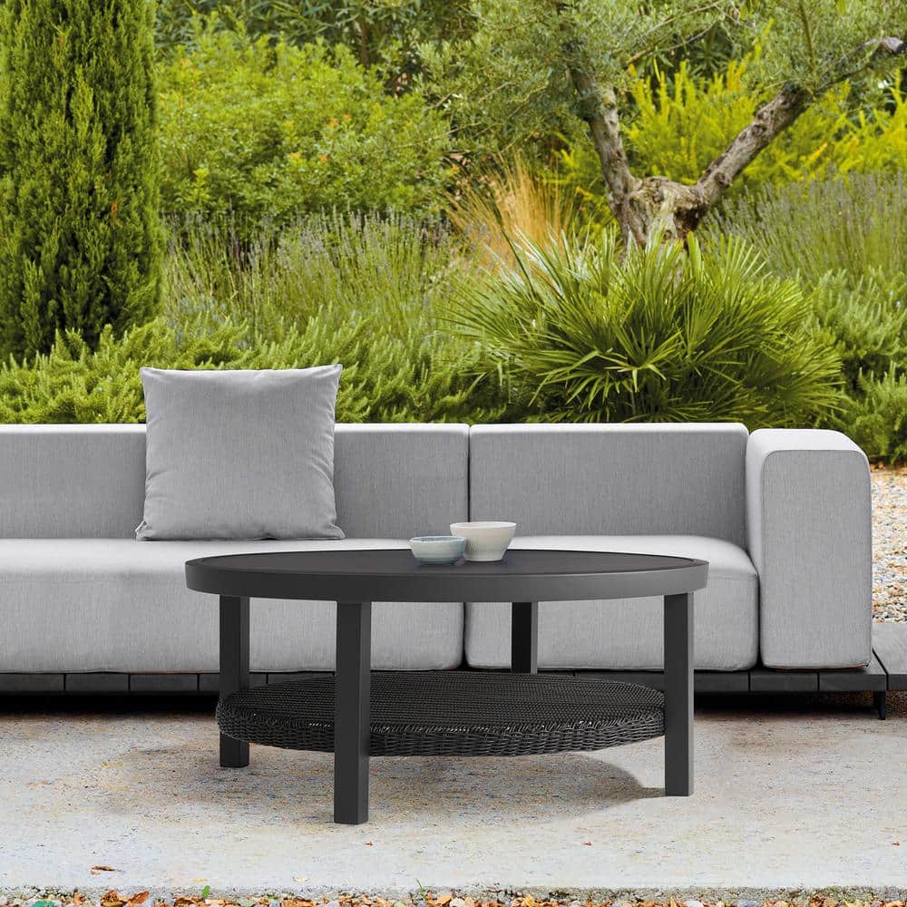 Grand Black Aluminum Round Outdoor Coffee Table with Wicker Shelf