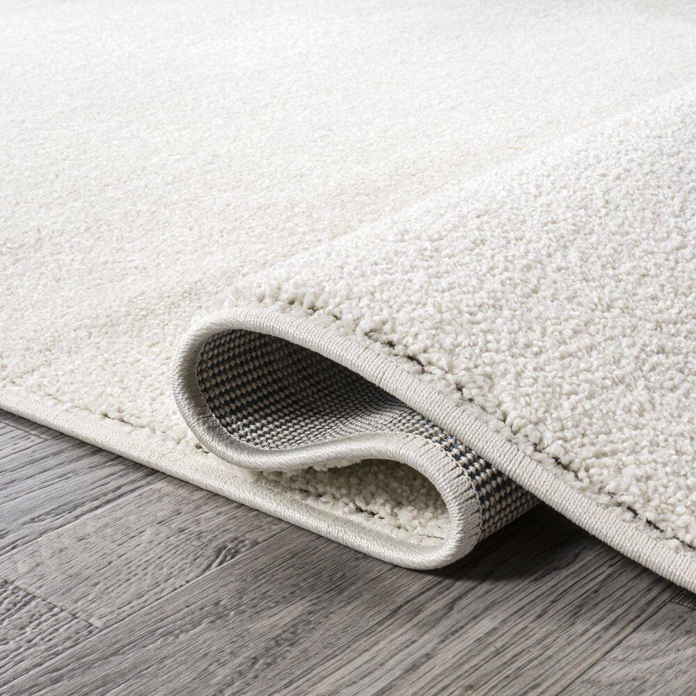 Cream Solid Low-Pile Synthetic 3' x 5' Area Rug