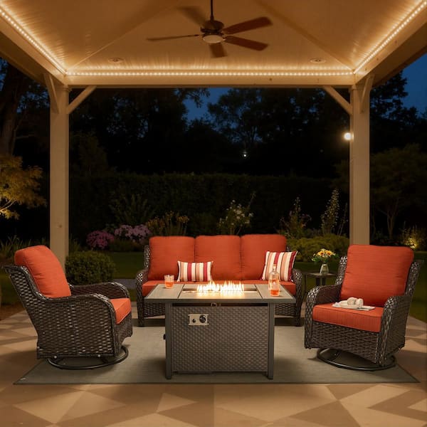 Nerium A 5-Piece Wicker Outdoor Patio 50000 BTU Fire Pit Conversation Set with Swivel Chairs and Orange Red Cushions